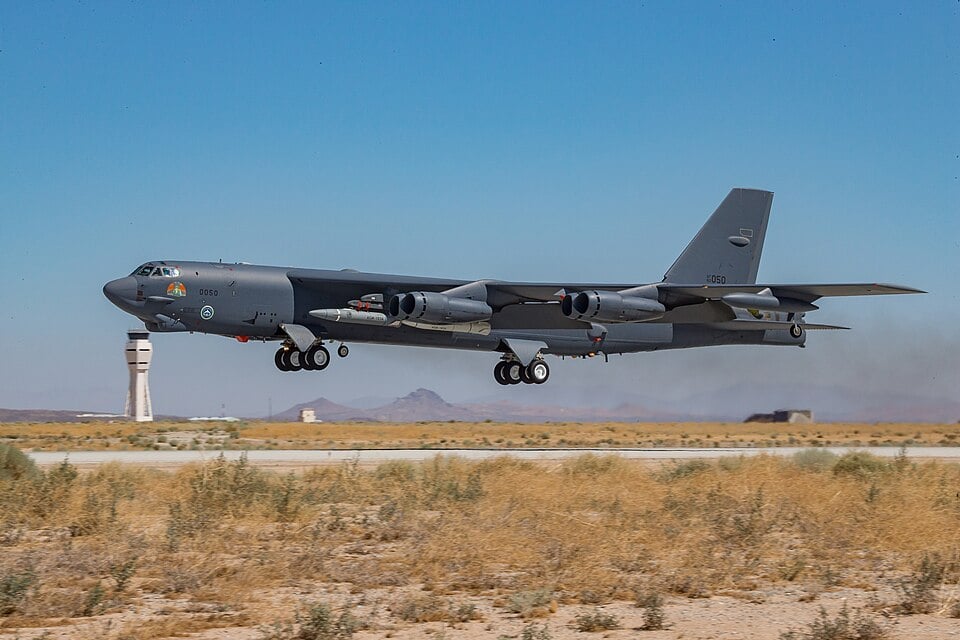 A B-52H taking off on a captive-carry flight with an AGM-183A ARRW test prototype under the wing