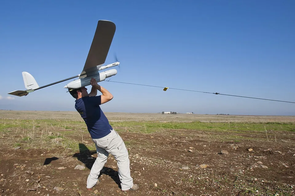 Elbit Skylark small UAV being hand-launched